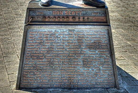 The base of Bon Scott's statue in Fishing Boat Harbour, Fremantle.